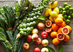 a group of fruits and vegetables on a wood surface Healthy Weight Loss Diets Hucknall